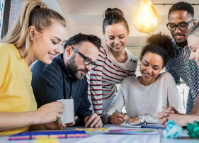 photo of people looking at a form